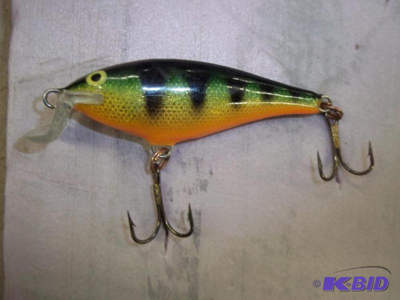 lot 137 image: Vintage Rapala lure see photos for size and m...