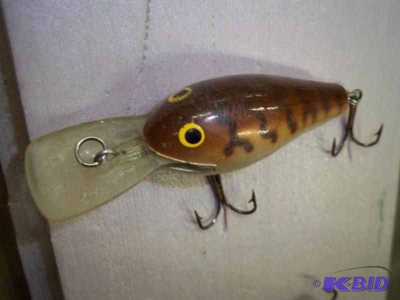 lot 140 image: Vintage Rapala lure see photos for size and m...