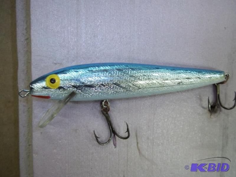 lot 142 image: Vintage Rapala lure see photos for size and m...