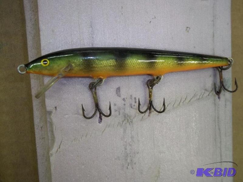 lot 143 image: Vintage Rapala lure see photos for size and m...