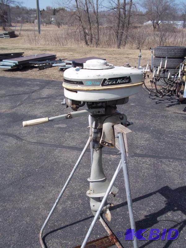 lot 26 image: 3 12 HP Sea King outboard motor,  Stand...