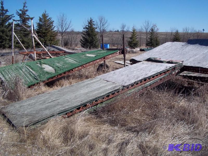 lot 285 image: 56 steel dock with 8 x 12 patio with wheels...