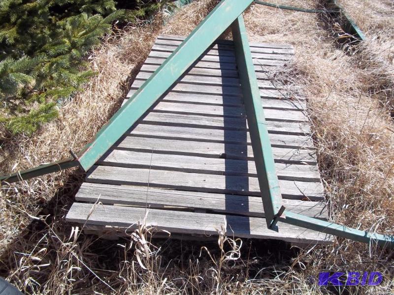 lot 32 image: 2- 3 x 12 steel dock frames with wood and whe...