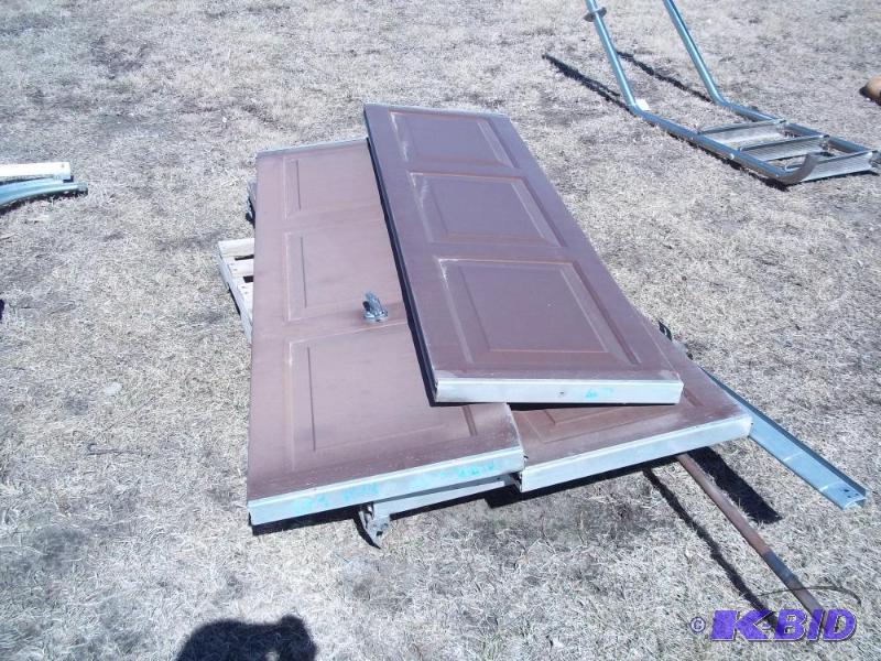 lot 9 image: 6 x 7 Steel insulated garage door with all ...