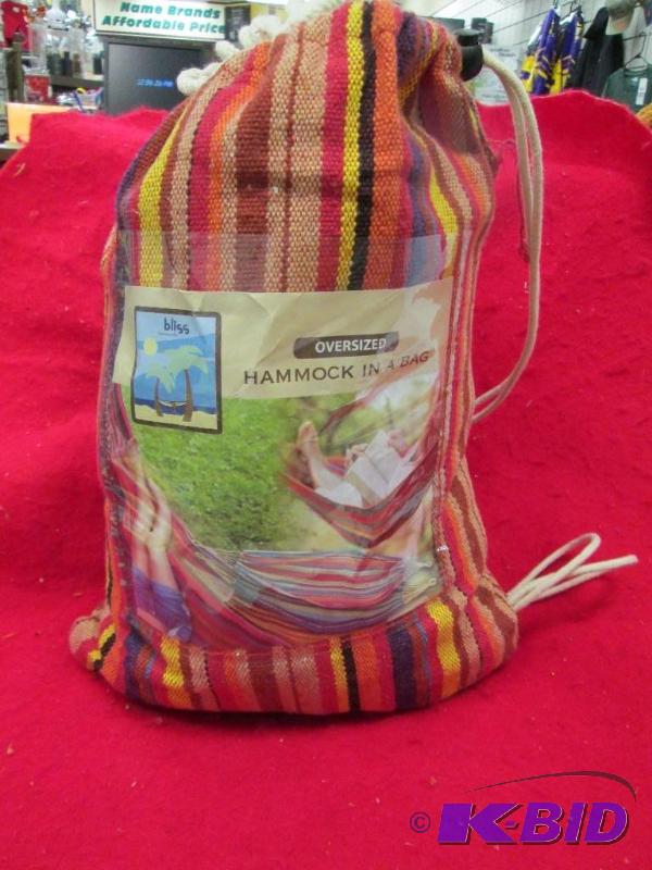lot 101 image: Oversized Hammock in a bag 65" L X 60&q...