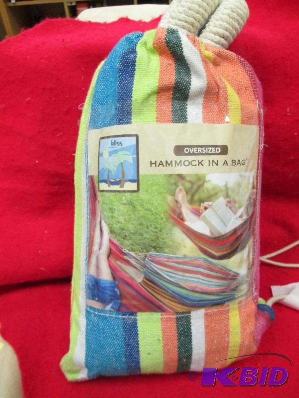 lot 102 image: Oversized Hammock in a bag 65" L X 60&q...