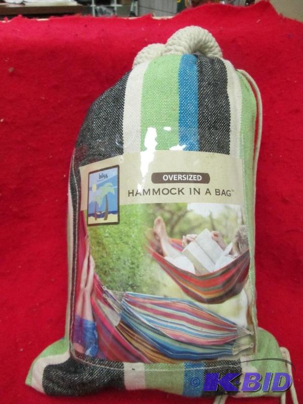 lot 128 image: Oversized Hammock in a bag 65" L X 60&q...