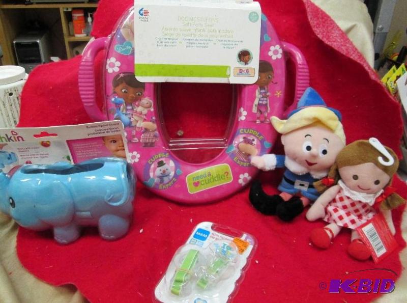 lot 233 image: Munchkin Bubble spout guard, Doc McStuffins s...