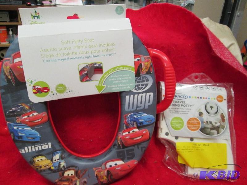 lot 235 image: Soft potty seat Cars, an a graco travel foldi...