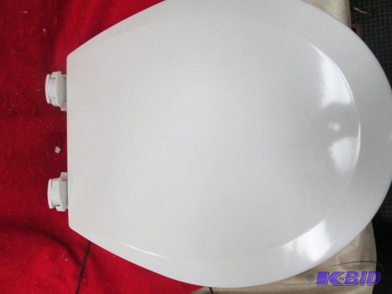 lot 286 image: White toilet seat...