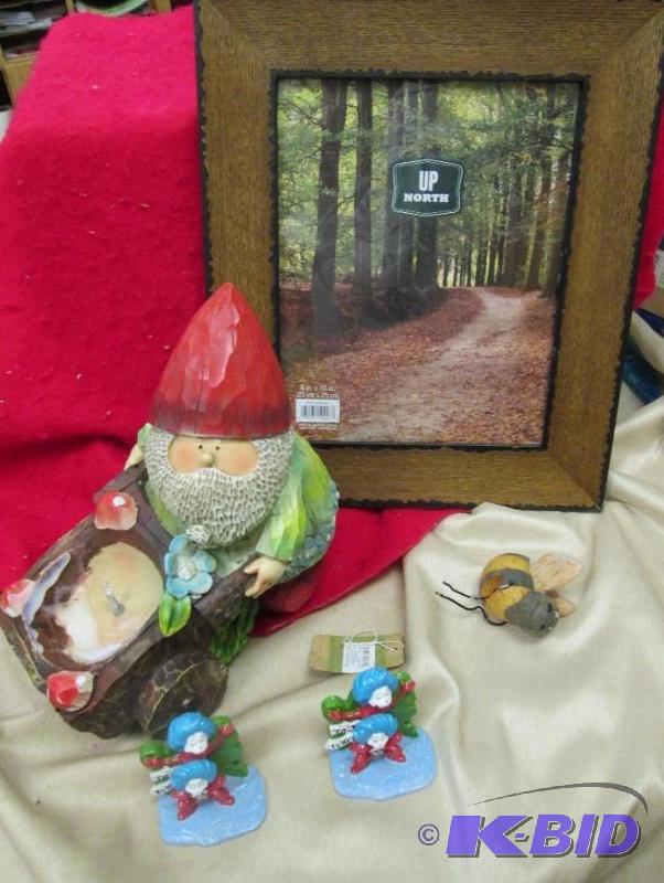 lot 79 image: 8 x10 wooden picture frame, person pushing a ...