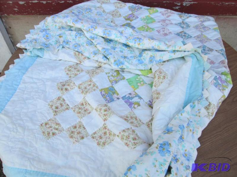 Handmade blue and white quilt with intricate ...