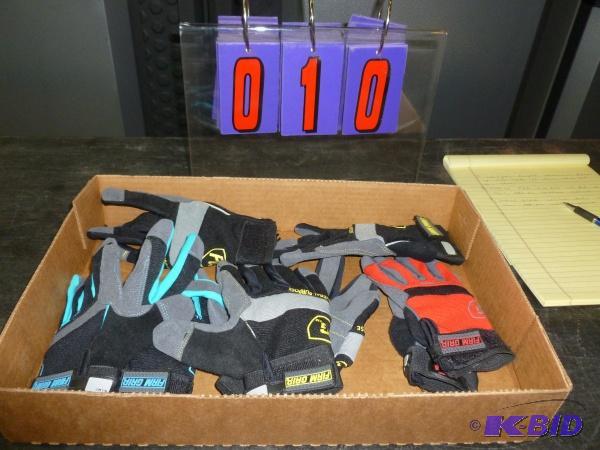 lot 10 image: Flat of gloves. As shown. Size medium. Terms....