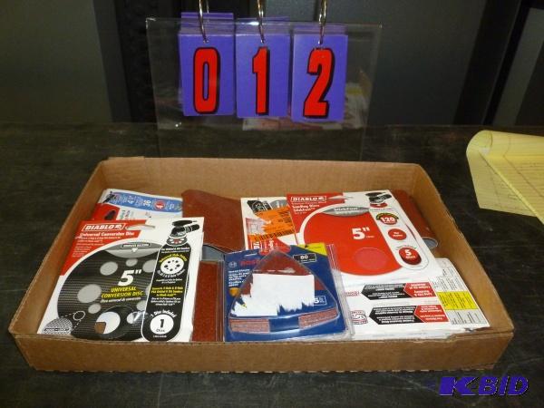 lot 12 image: Flat of sanding belts and pads. As shown. Ter...
