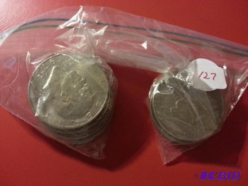 LOT OF 10 MIXED DATES IKE DOLLAR COINS...