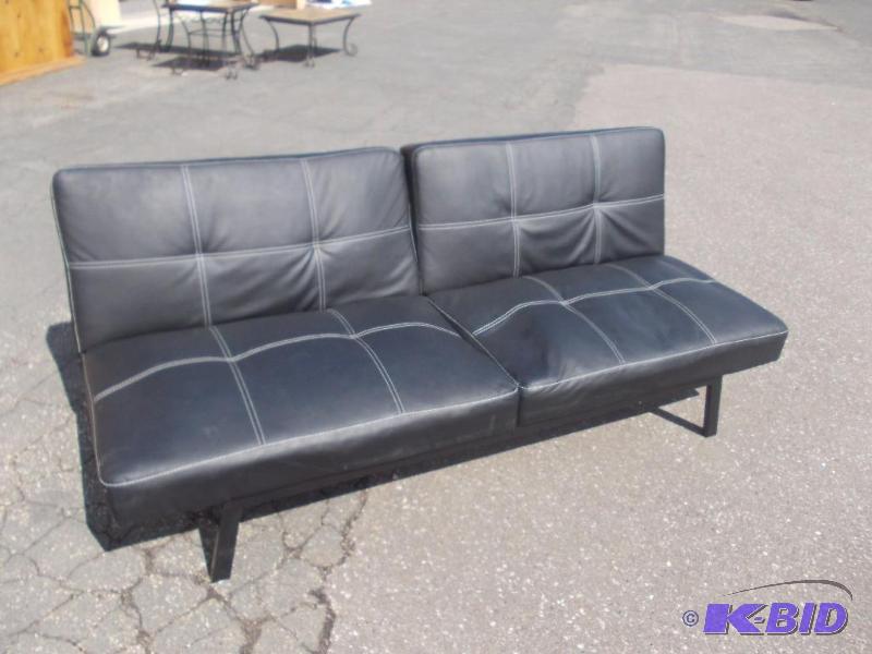 lot 12 image: Klick-Klack Style Futon (Black) 70"...
