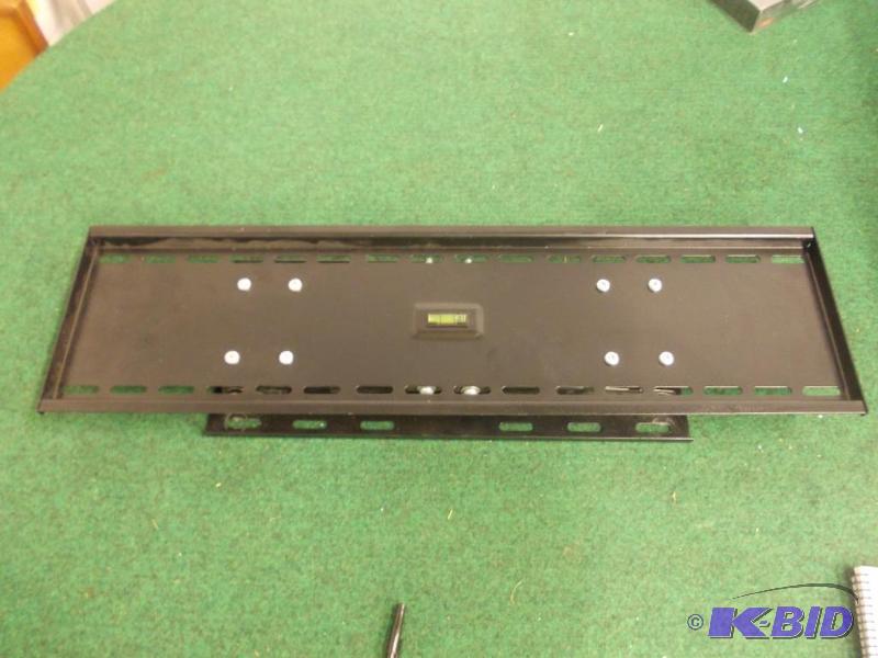 lot 32 image: 28 12 Inch Wall Mount TV Bracket...