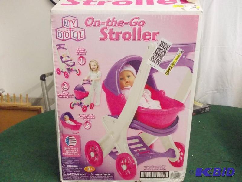 lot 34 image: Toy Doll Stroller (Needs To Be Assembled)...