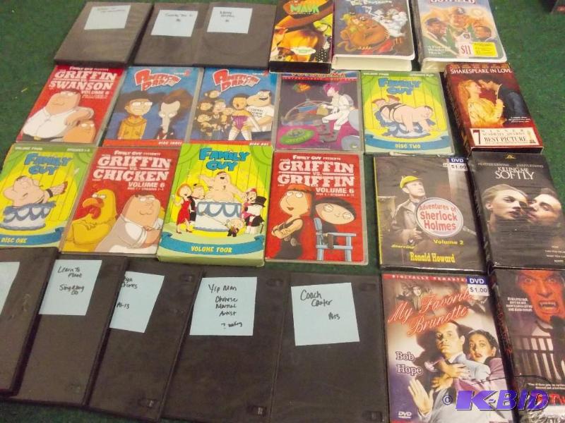 lot 55 image: 25-DVDS & VHS...