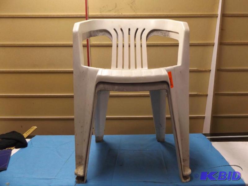 Five stackable lawn chairs...