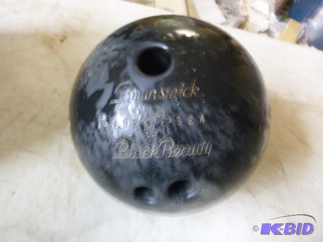 lot 131 image: Brunswick Black Beauty Bowling Ball...
