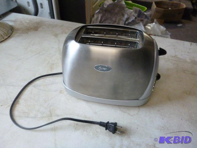 lot 15 image: Oster Toaster...