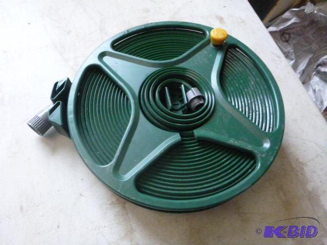 lot 34 image: Garden Hose with Reel...
