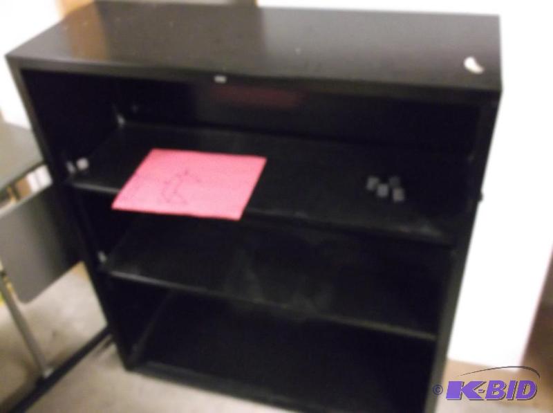 lot 157 image: Metal bookshelf measuring 34 12" L x 12...
