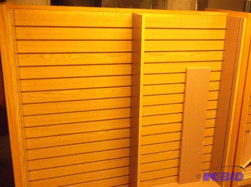 lot 17 image: 2 sided bookshelf on castors measuring 58 78...