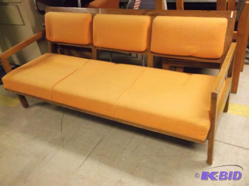 lot 175 image: Waiting area oak cushioned bench measuring 68...