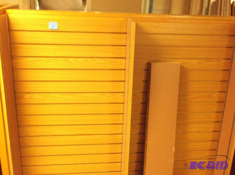 lot 18 image: 2 sided bookshelf on castors measuring 57 78...
