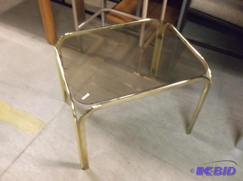 lot 49 image: Glass top end table in good usable condition....