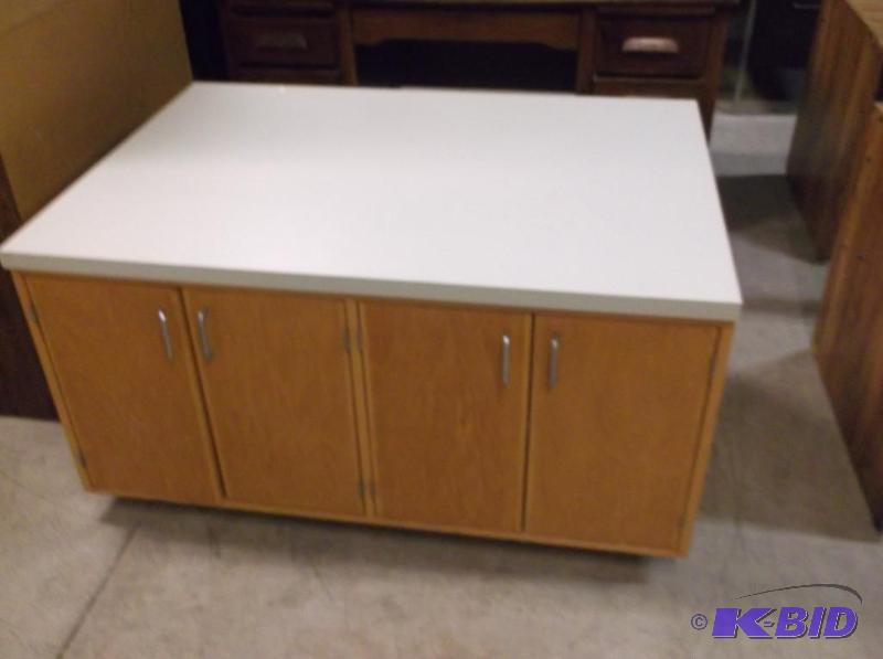 lot 59 image: Large laminate top cabinet in good usable con...
