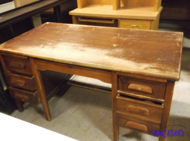 lot 61 image: Vintage solid wood desk has finish loss still...