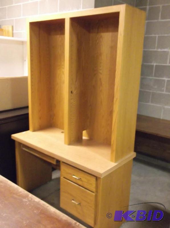 lot 62 image: Large oak like desk with shelving area in usa...