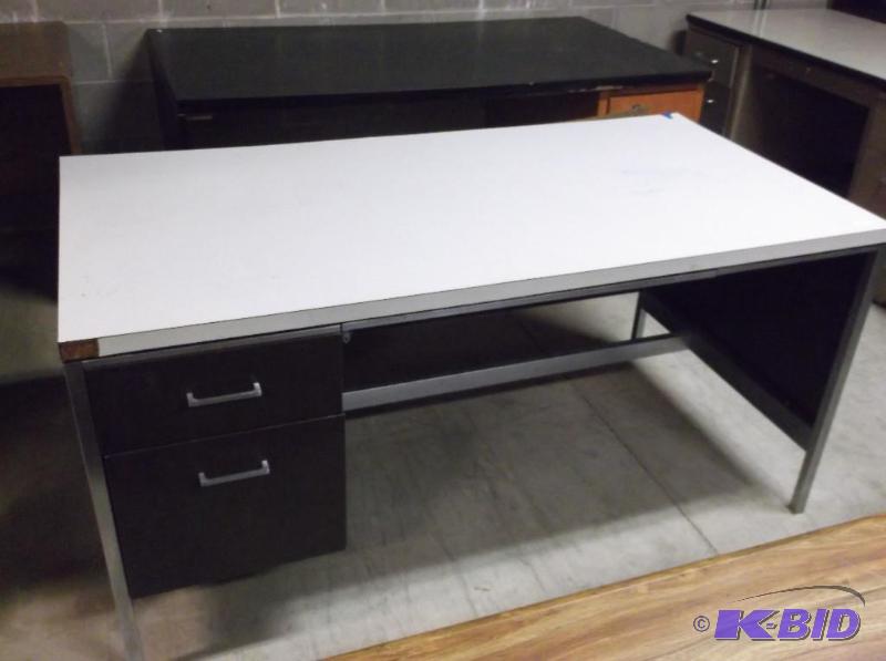 lot 63 image: Laminate top desk in usable condition....