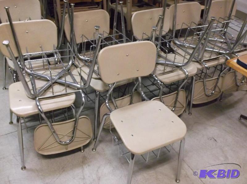 lot 69 image: Lot of 13 poly student chairs with book stora...