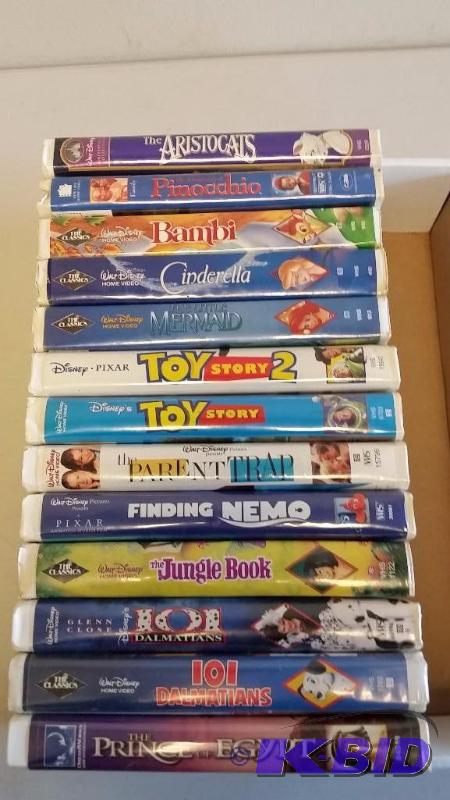 lot 37 image: Flat of Disney VHS Movies.  Checked to see that all movies are there.