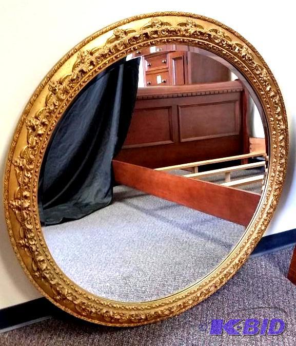 lot 4 image: Large Round Beveled Glass Gold Framed Mirror.