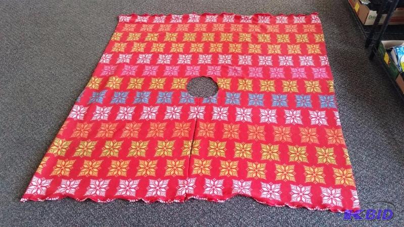 lot 45 image: Fleece Fabric Cut like a Poncho.  Un-finished sides.  60 x 58  Snowflake pattern Red Fleece