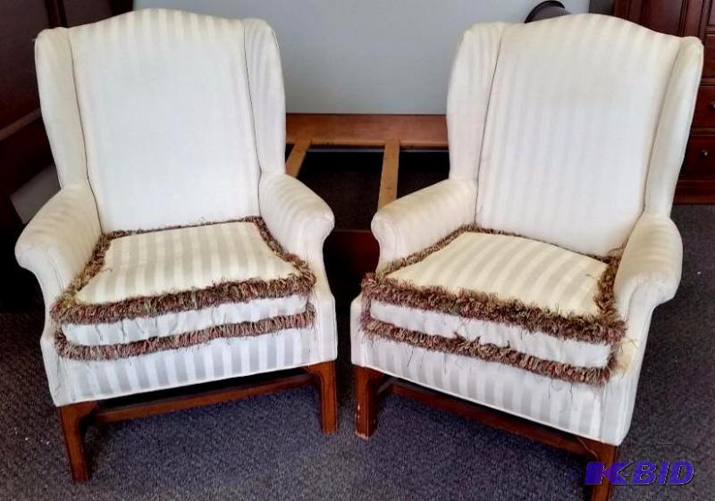 lot 5 image: A Pair of Matching Wingback Chairs.