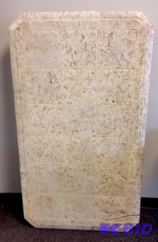 lot 7 image: Faux Stone Coffee Table with Metal accents.  No Legs.  32.5 x 56.5 x 7 Skirt