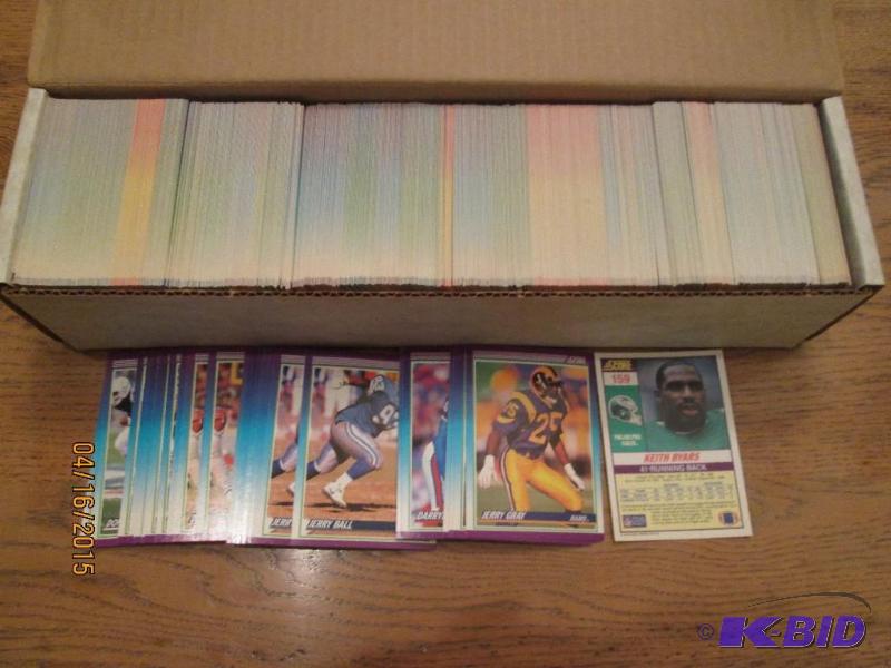 Box of 1990 Score Football cards...