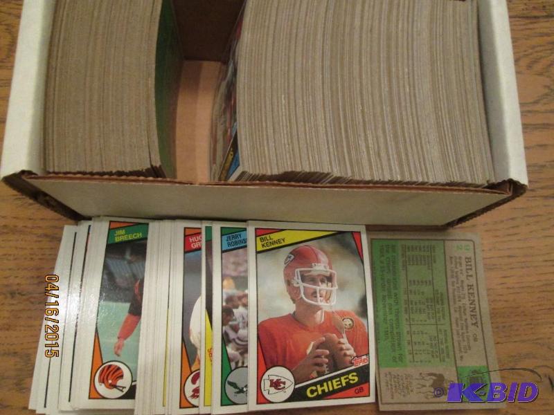 Box of 1984 Topps football sports cards...