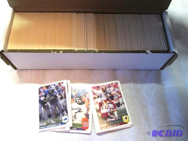 Box of 1992 Fleer football collector cards...