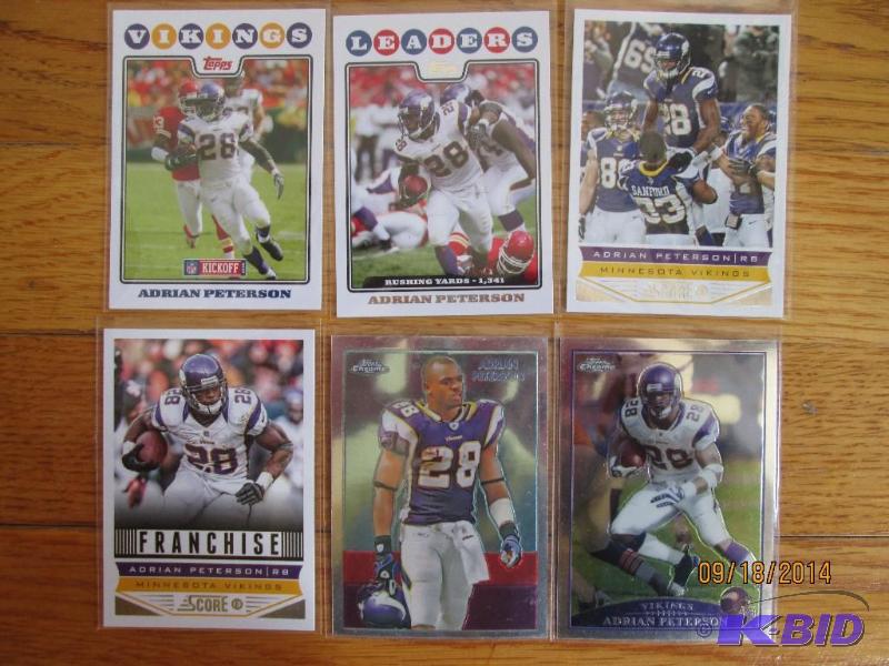 6 Adrian Peterson sports cards...