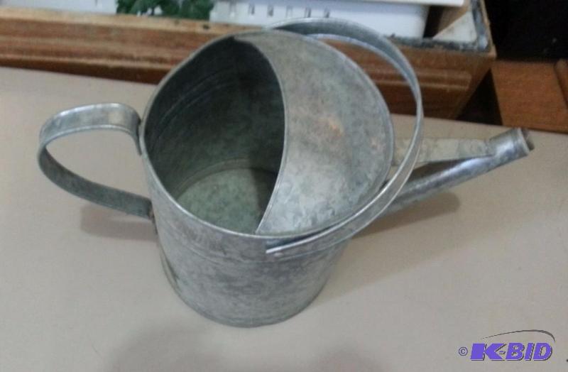 Metal Flower waterier with planter...