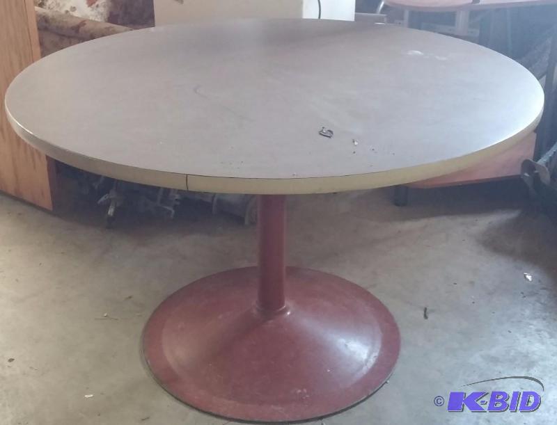 LARGE Round metal based table. This table is ...