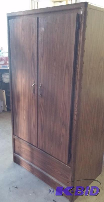 Wardrobe that shelves have been added to. The...