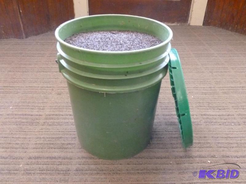 lot 105 image: Large bucket of bird thistle seed, weighs abo...